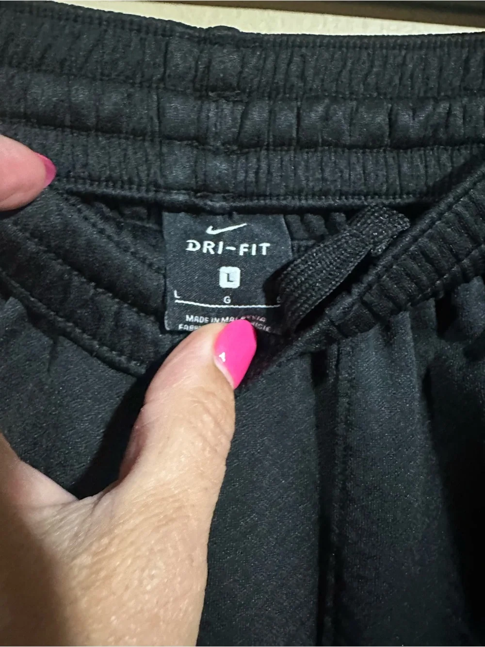Nike Boy’s Black Athletic Mesh Shorts with White Swoosh
